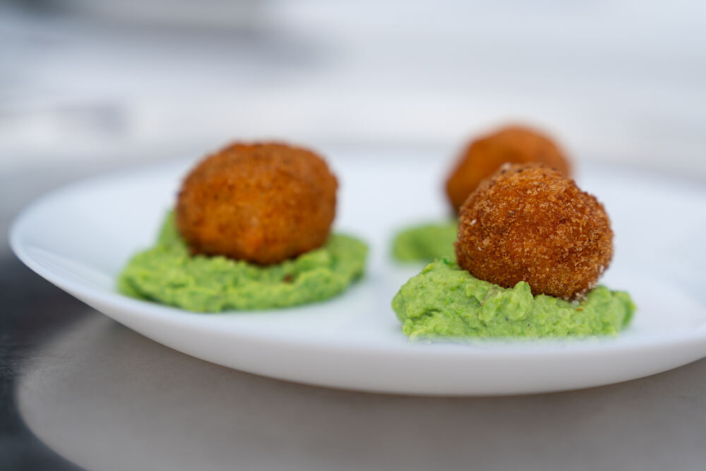 Piatto gourmet a base di trota presentato durante l'edizione 2025